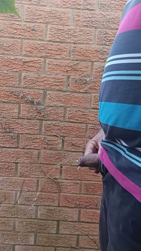 Needing a piss in the garden.