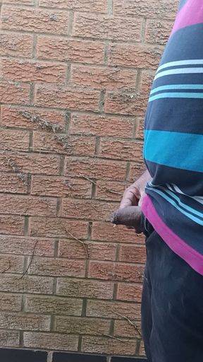 Needing a piss in the garden.