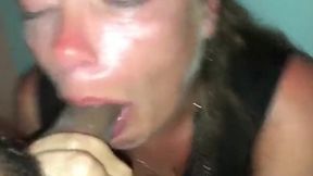 Mature Brunette's Interracial Blowjob