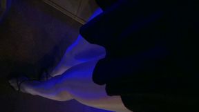 Showing my long legs playing with dark light to see the shine of my pantyhose.