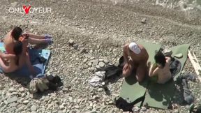 beach voyeur. nudist couples having sex on the beach right in front each other