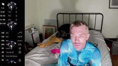 male camming model seducing viewer in his blue bedazzled superhero bodysuit (lol no homo)