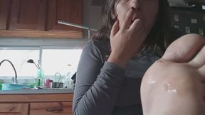Lola picks her nose and sticks the snot on her foot