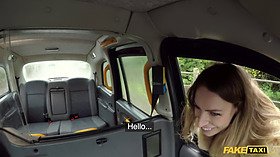 Ava Austen rides a big black dildo on the backseat