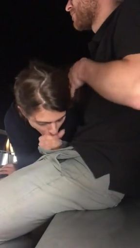 Man giving haircut to woman