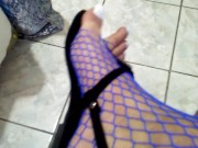 White long toenails and blue fishnets teasing