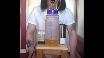 bisexual crossdresser with his portable cow milking machine