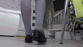 long day at work in tight black flats back view b