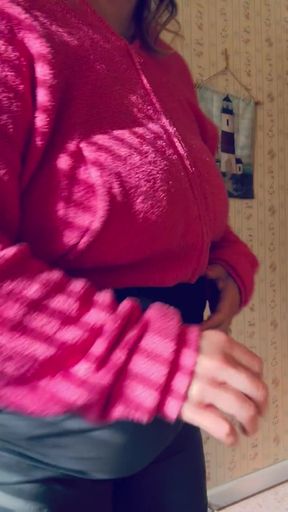Woman in pink sweater