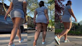 puerto rican boricua mami with thick legs and natural fat ass big booty walking with a switch in slow motion wearing a mini skirt and high heel wedge platform flip flops