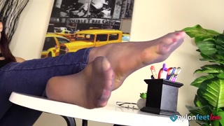 Tecla in jeans footplays with her hosed feet in your face