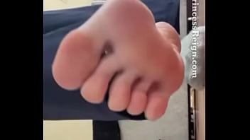 Feet finder on green nails sock shoe and foot worship