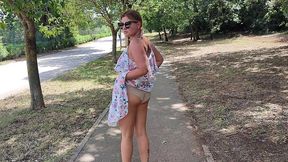 a cute teenage girl walks around the city naked in the middle of the day and then masturbates