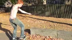 Redhead Skater Boy in the Hands of Mavericks