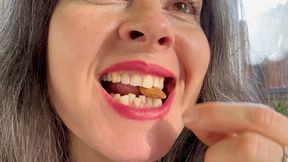 hard nuts crushed by her strong teeth aV