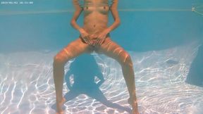 Outdoor sexy nude swimming by exhibitionist girl