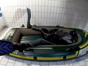 Wetsuit, Fins and Boat - geared pup pawing off