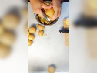 Peeling 'em Potatoe and greasing BACoN