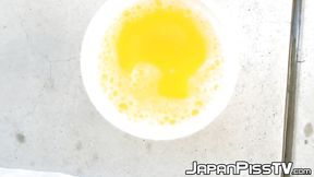 Japanese temptress enjoys measuring her own wetness