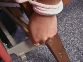 Sexy girl gets tits pinched while her legs and hands are bound