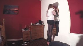 Sophie Doing Her Lip Stick In The Mirror Whilst Trampling Her Slaves Head