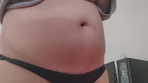 Chubby Girl Showing Off Her Bloated Belly