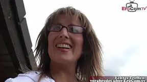 Mature German secretary gives a sultry solo performance on the street