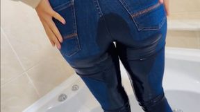 Peeing hard in skinny jeans and getting wet!