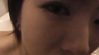 Japanese babe with natural tits receives warn mouth creampie