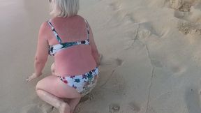 Woman Presenting Herself on the Beach