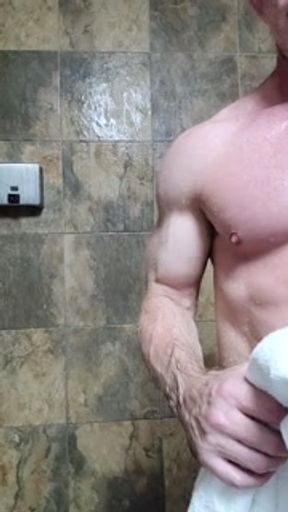 Muscle stud eats his own cum in gym shower after workout