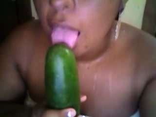 Fat Colombian nympho fucks her thick snatch with cucumber