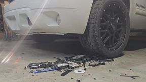 Chrissy running over VHS tapes