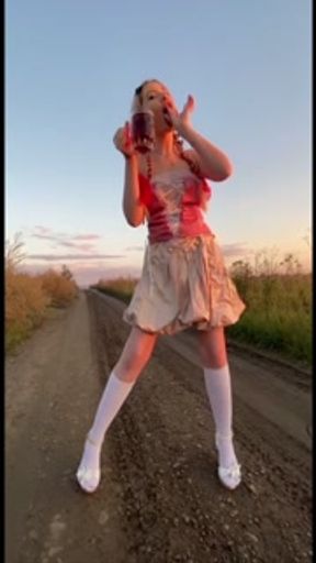 In the field showing my ass to passing cars