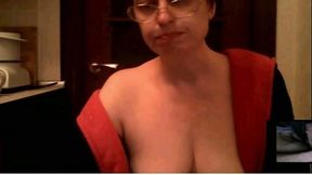 Mature nerdy nympho teased me with a nice topless show on webcam