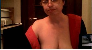 Mature nerdy nympho teased me with a nice topless show on webcam