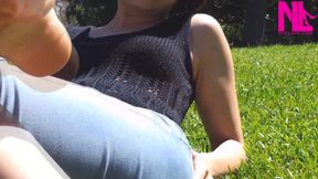 Nyllady Walking Barefoot on Th Grass in a Park