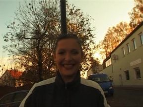 German girl giving an outdoor interview