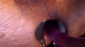 speculum and Long dildo in ass