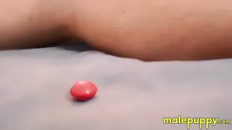 Giant Jeff Drizzle relaxes as a tiny intruder watches