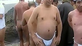 Japanese Bodybuilder Exhibiting At Matsuri On Public Beach