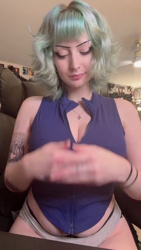 Goth big-titted babe shows off her ass and boobs