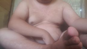 Masturbating