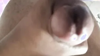 Solo teen strokes his big cock in the shower with a dildo