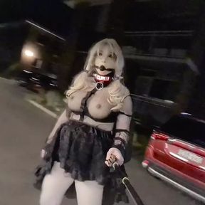 Slut in transparent clothing ball gag and LED dog collar caught in public