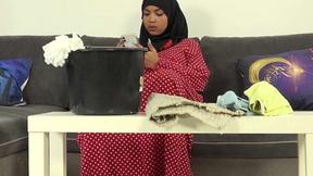 ”Unshaved female in hijab doing extra cleaning”