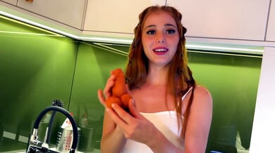 Redhead lya teases with full exposure in a sleek kitchen under voyeur eyes