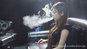 Elegant Asian Woman Chain-Smoking Cigarettes During Candid Q&A Session — TAO1 HD
