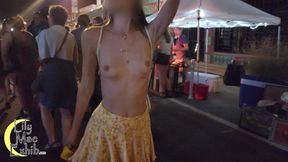 Going totally topless and flashing pussy at the street festival!