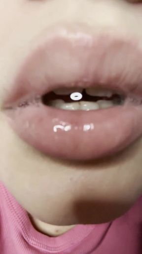 Long-tongued babe satisfies her tongue-fetish